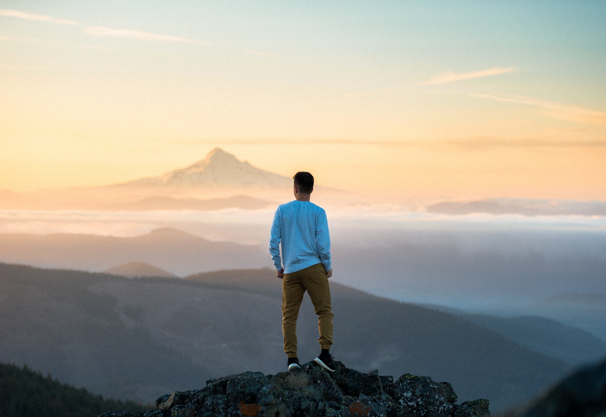 person standing on the mountain